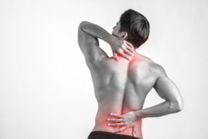 A patient discussing a personalized treatment plan with specialists at a comprehensive center for pain management